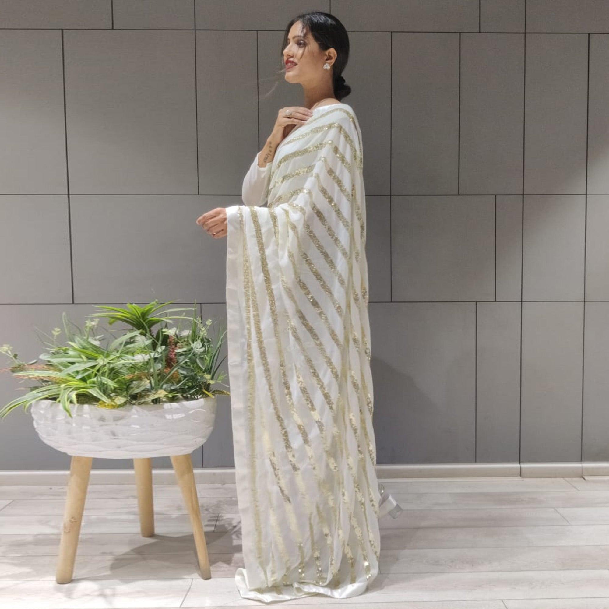 White Sequence Embroidered With Stripes Georgette Saree - Peachmode