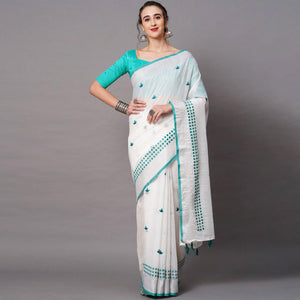 White - Turquoise Casual Wear Embroidered Linen Saree With Tassels - Peachmode
