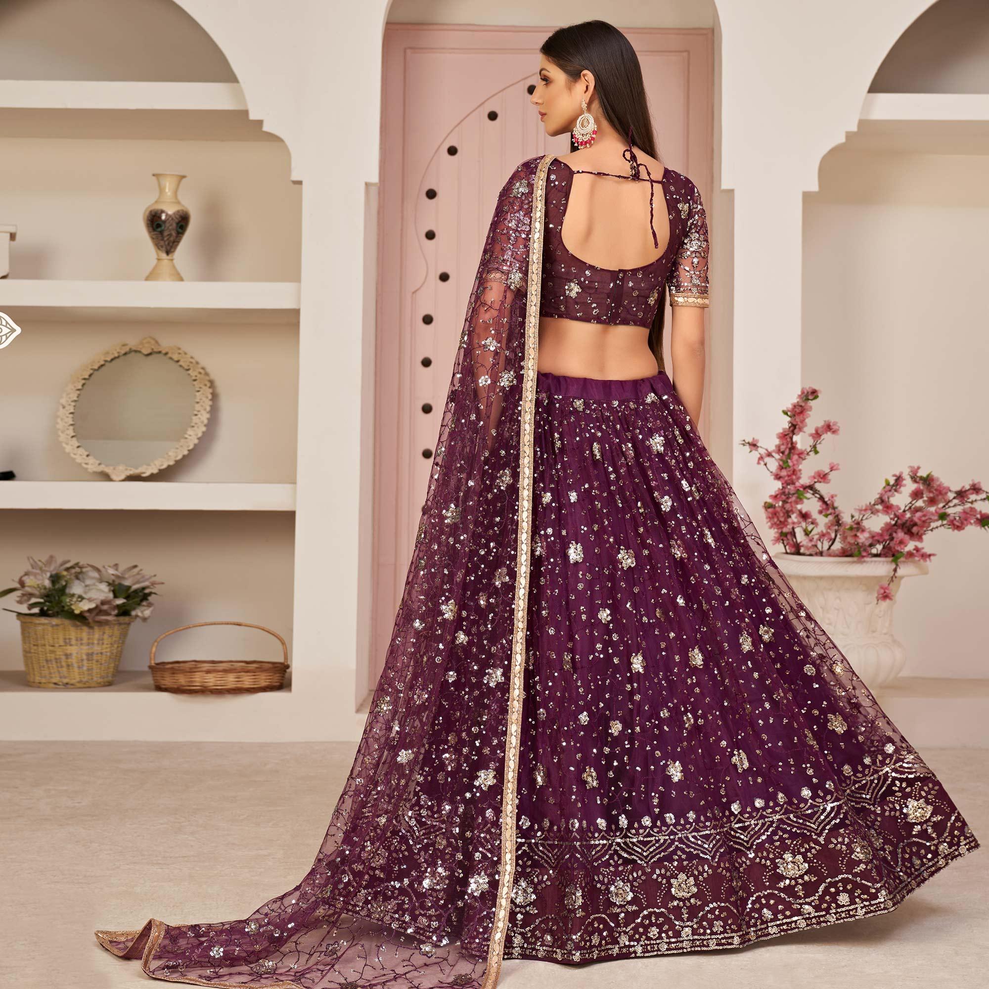 Wine Sequence Embroidered Netted Lehenga Choli - Peachmode