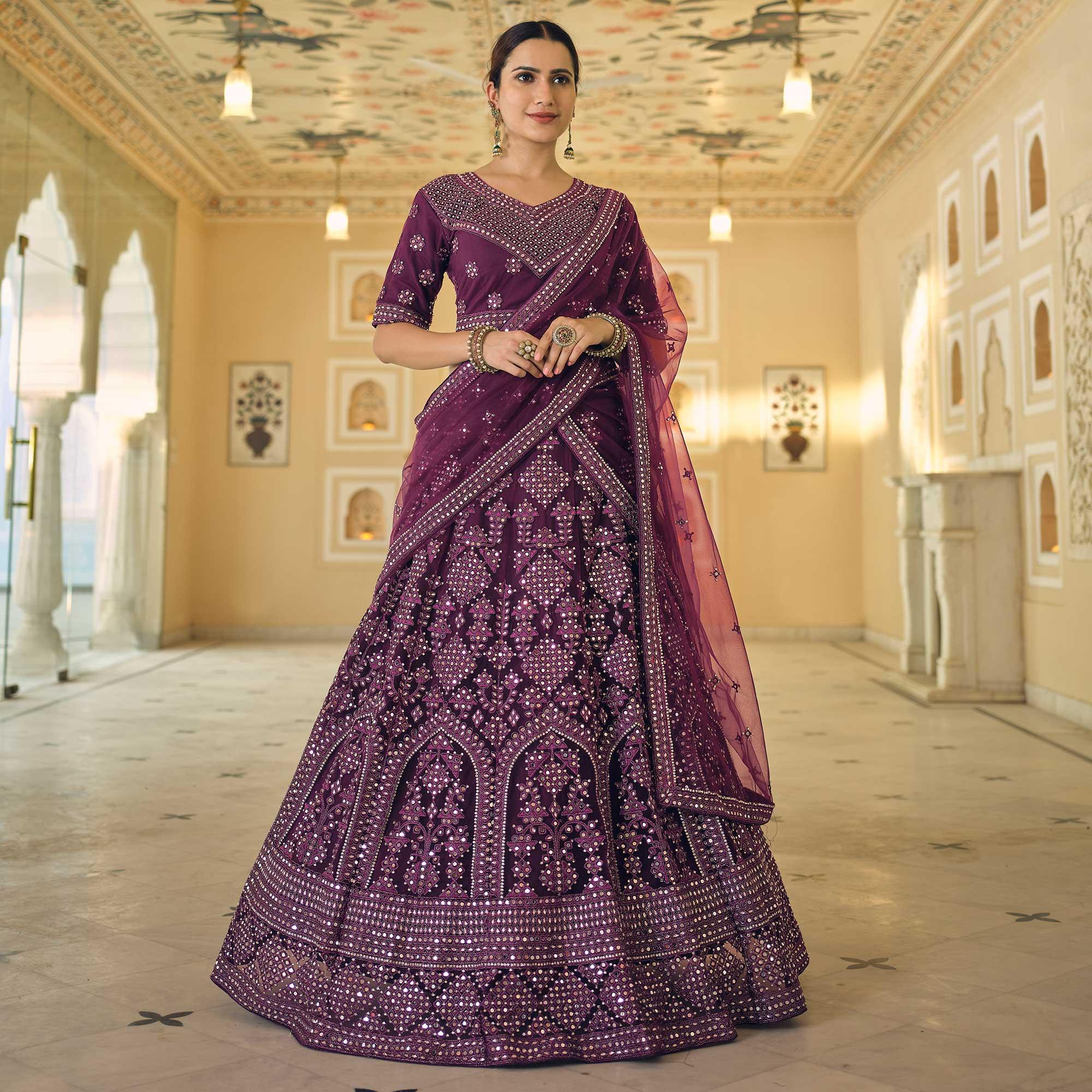Wine Wedding Wear Embellished Netted Lehenga Choli - Peachmode