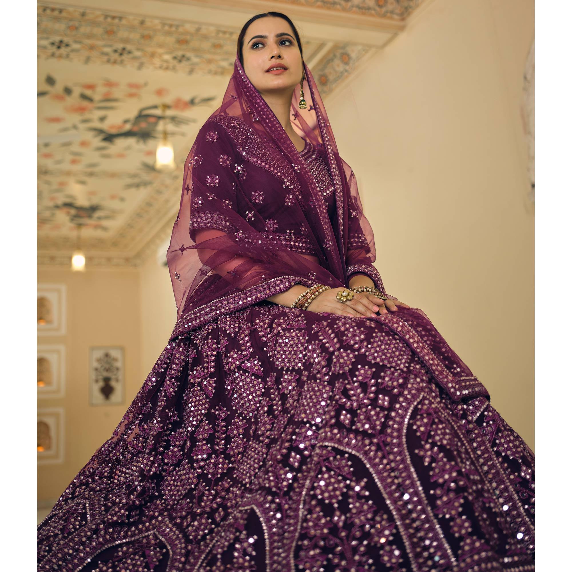 Wine Wedding Wear Embellished Netted Lehenga Choli - Peachmode