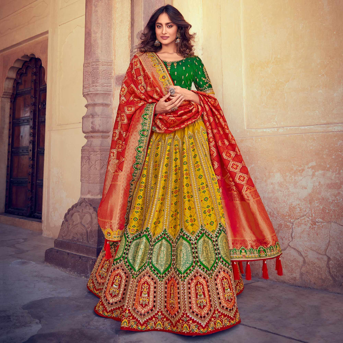 yellow and red wedding wear woven and embroidered silk lehenga choli peachmode