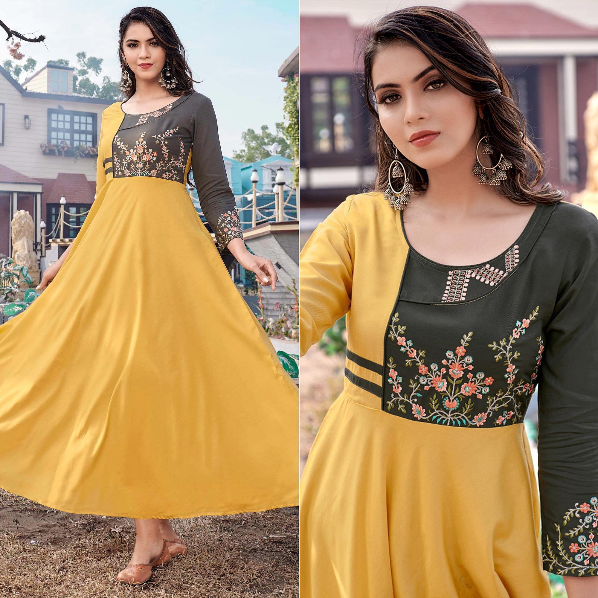 Yellow Casual Wear Embroidered Rayon Gown - Peachmode