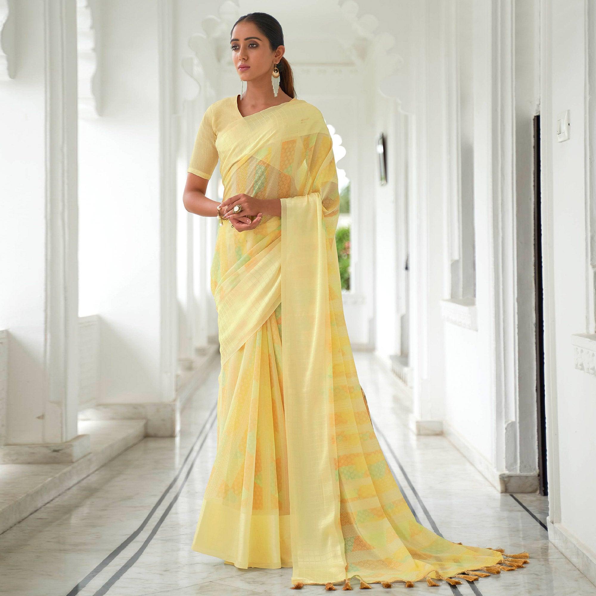 Yellow Casual Wear Foil Printed Georgette Saree With Jacquard Border - Peachmode
