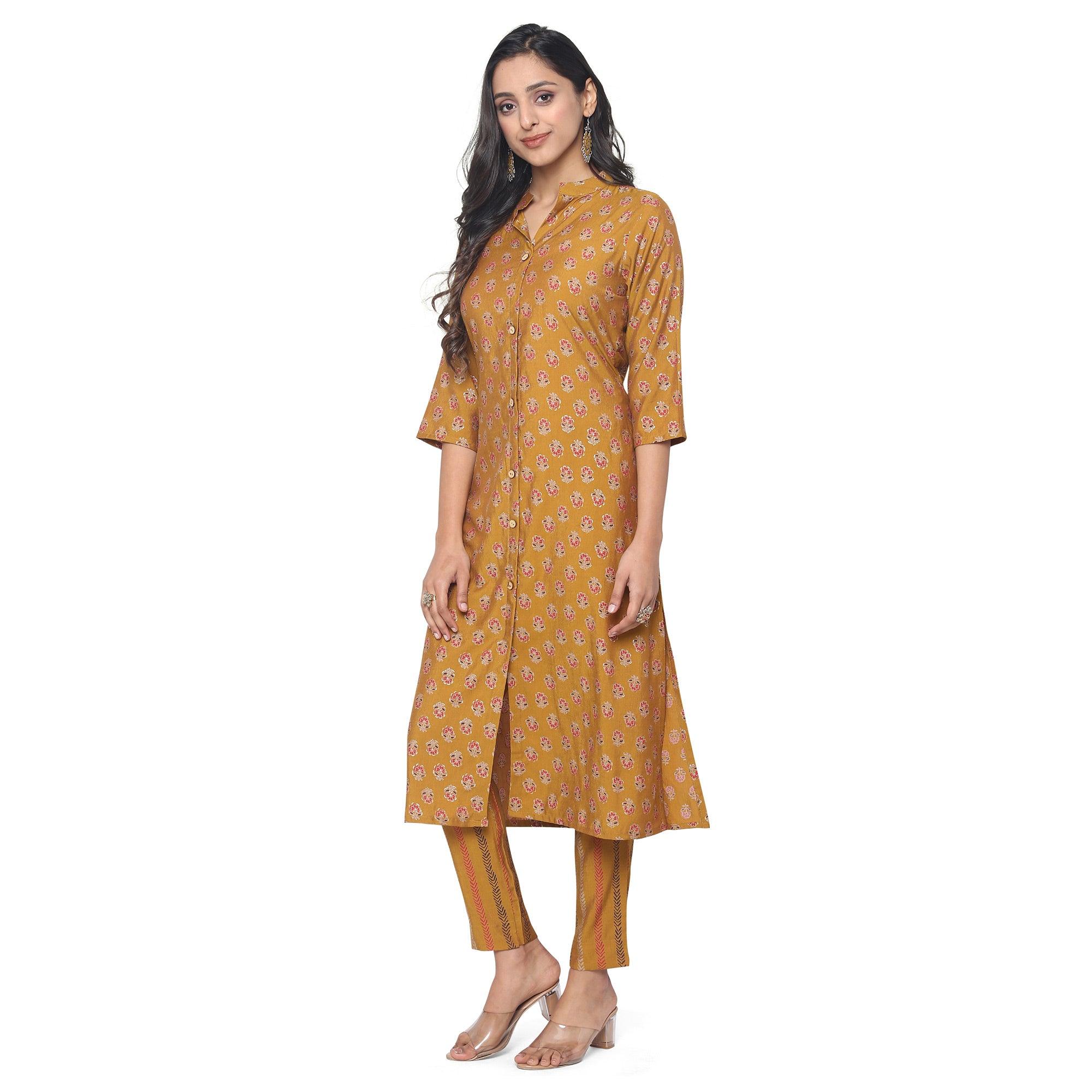 Yellow Casual Wear Foil Printed Muslin Kurti Pant Set - Peachmode