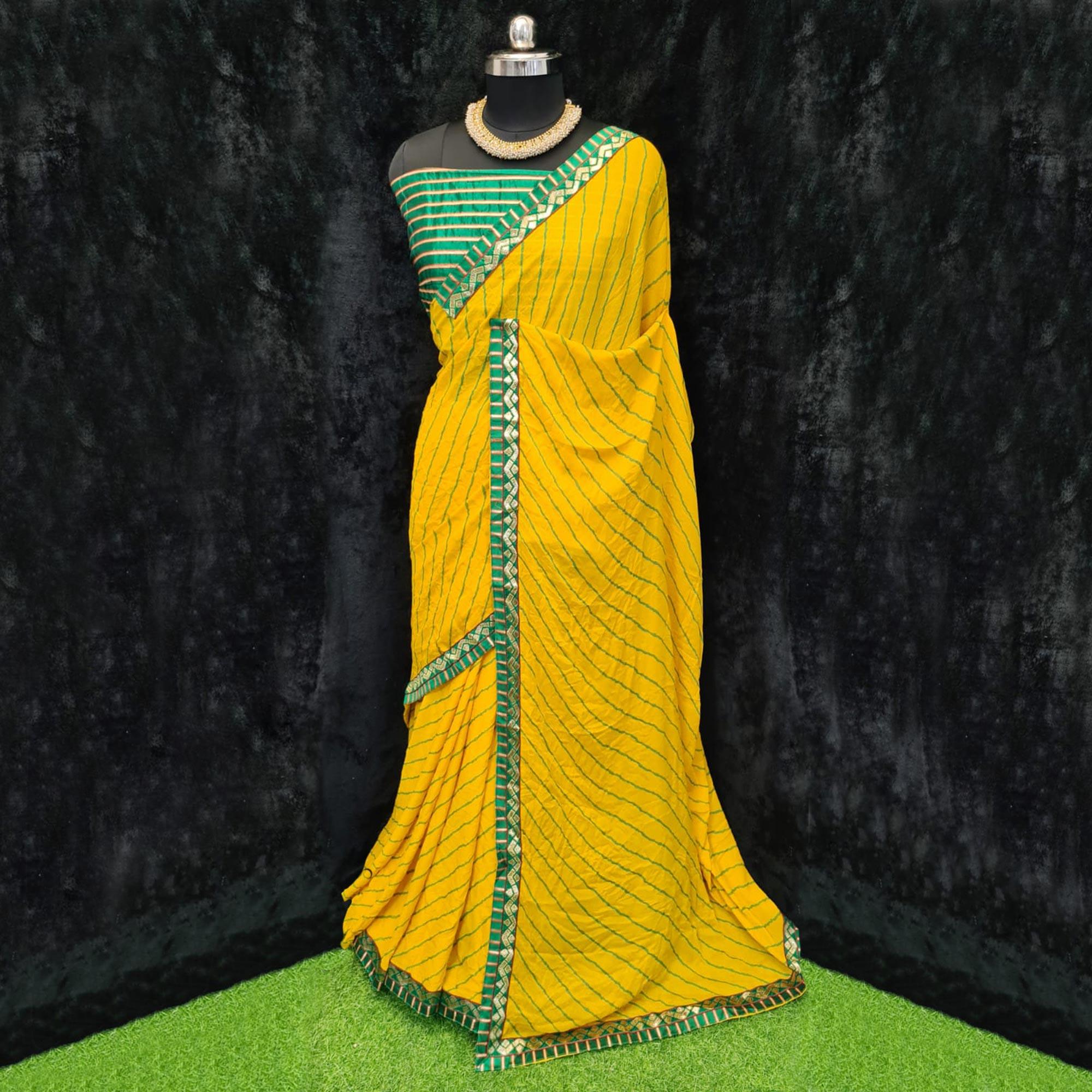 Yellow Casual Wear Printed Georgette Saree With Lace Border - Peachmode