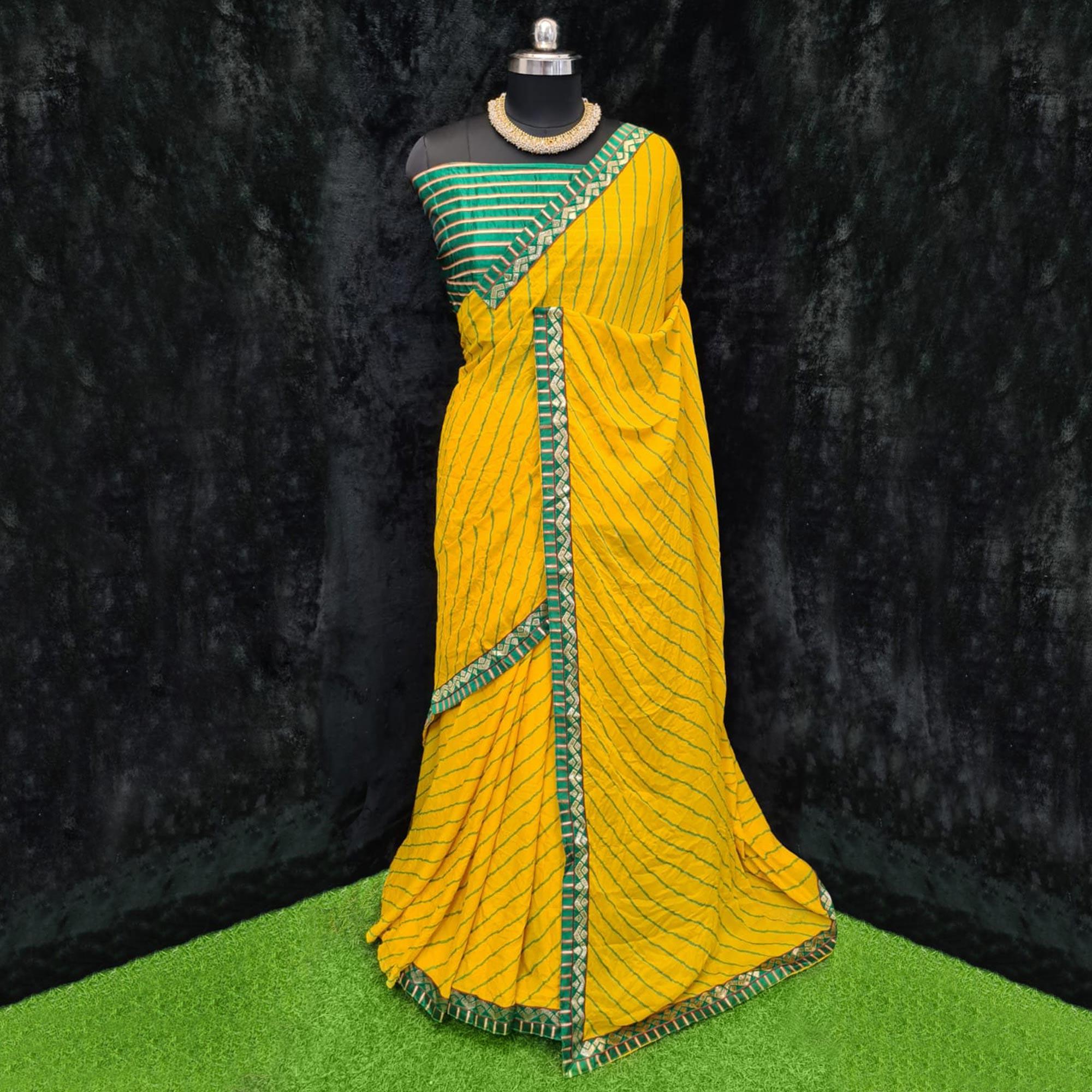 Yellow Casual Wear Printed Georgette Saree With Lace Border - Peachmode