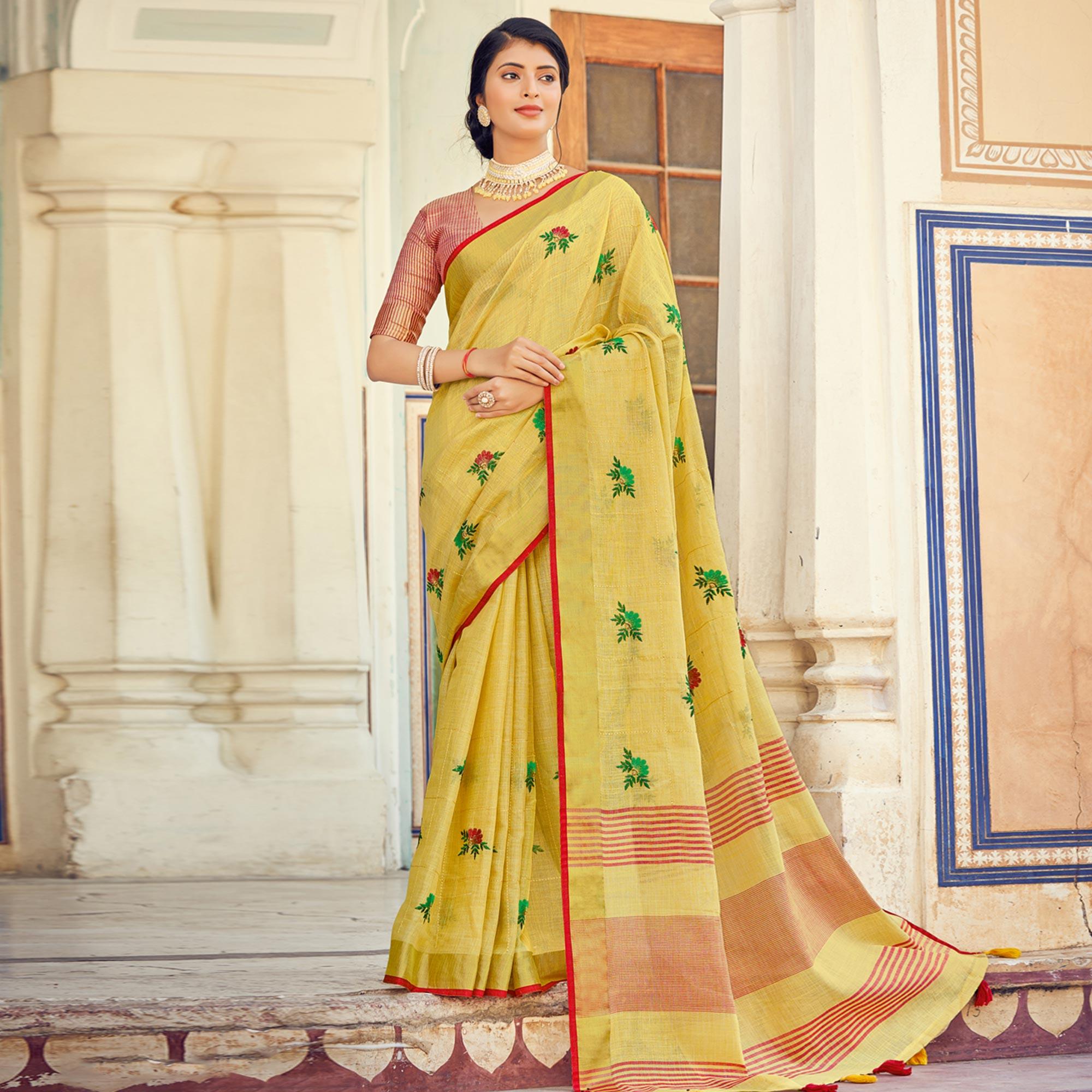Yellow Embroidered Linen Saree With Tassels - Peachmode