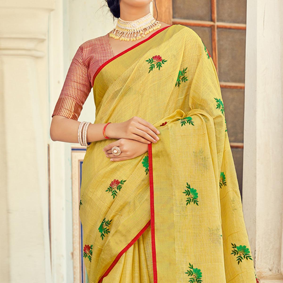 Yellow Embroidered Linen Saree With Tassels - Peachmode