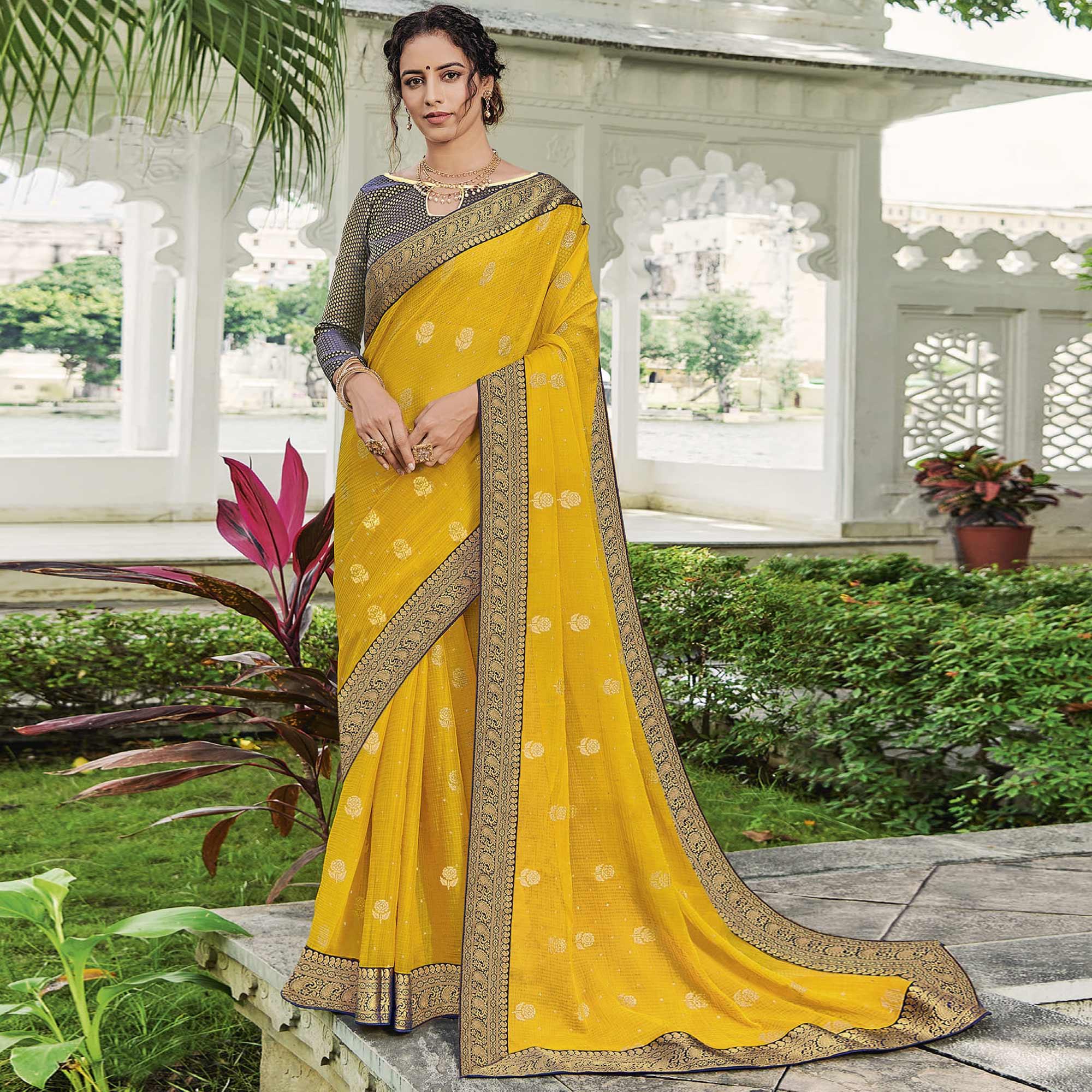 Yellow Festive Wear Woven & Embelllished Chiffon Saree - Peachmode