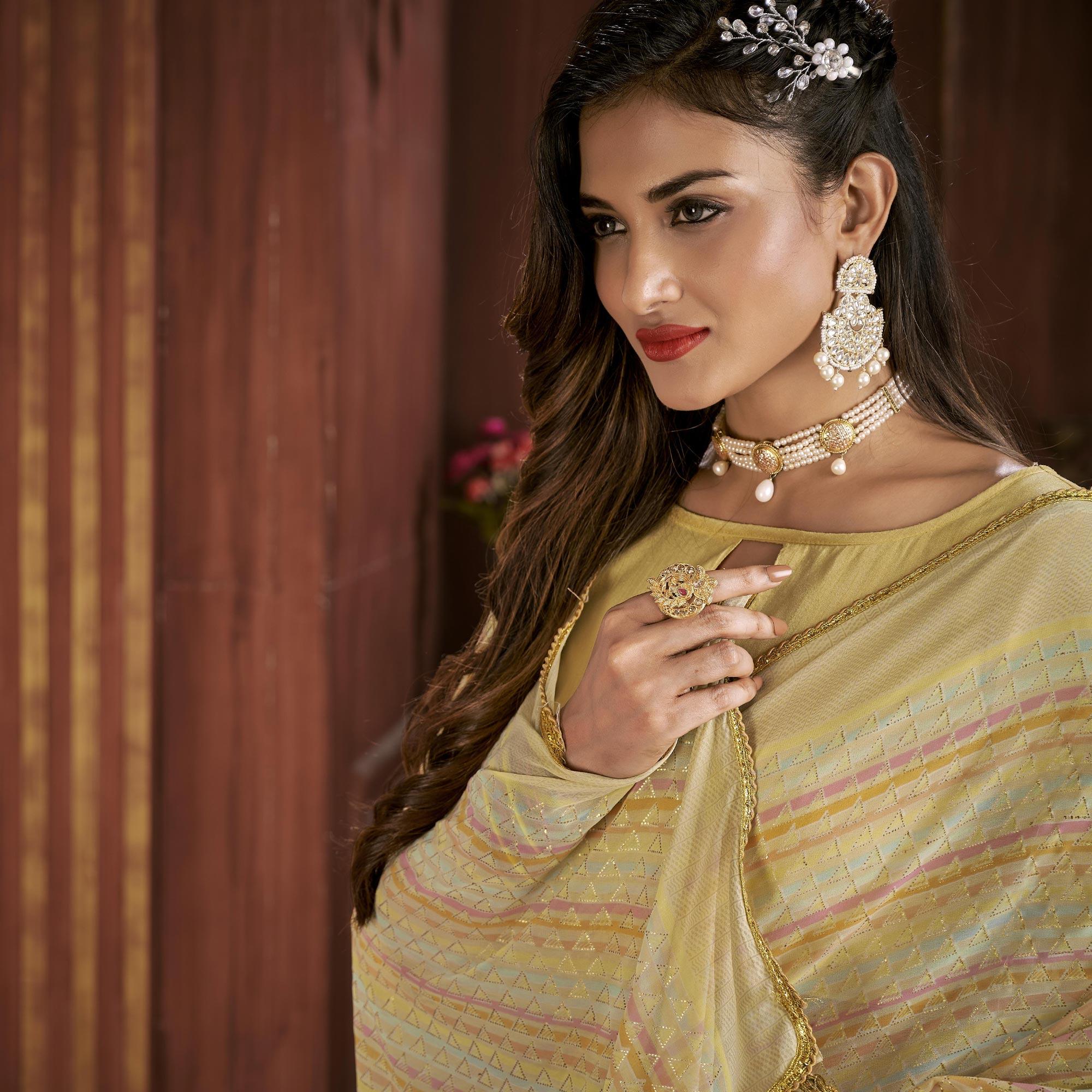 Yellow Foil Printed Georgette Saree - Peachmode