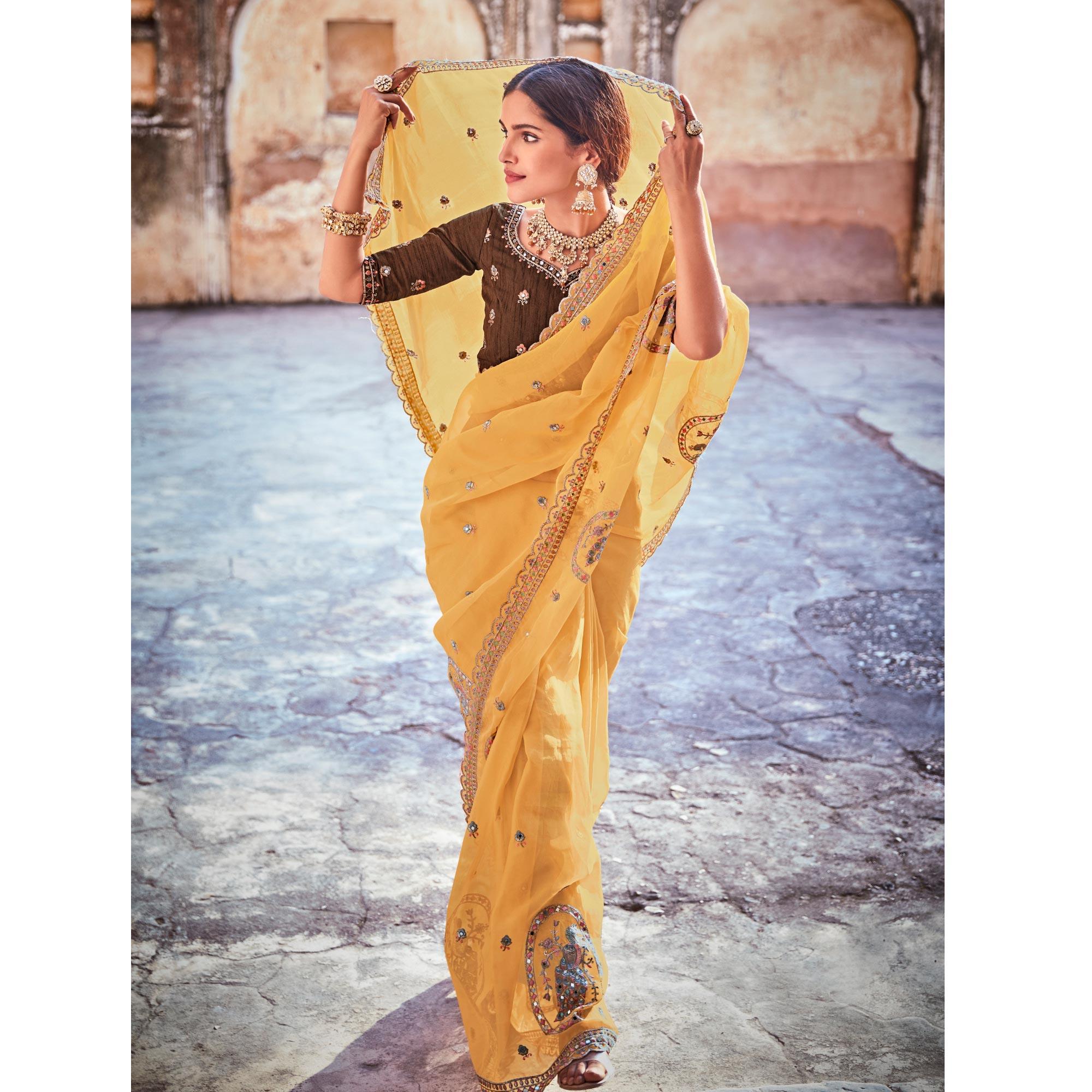 Yellow Partywear Embellished & Zari Organza Saree - Peachmode