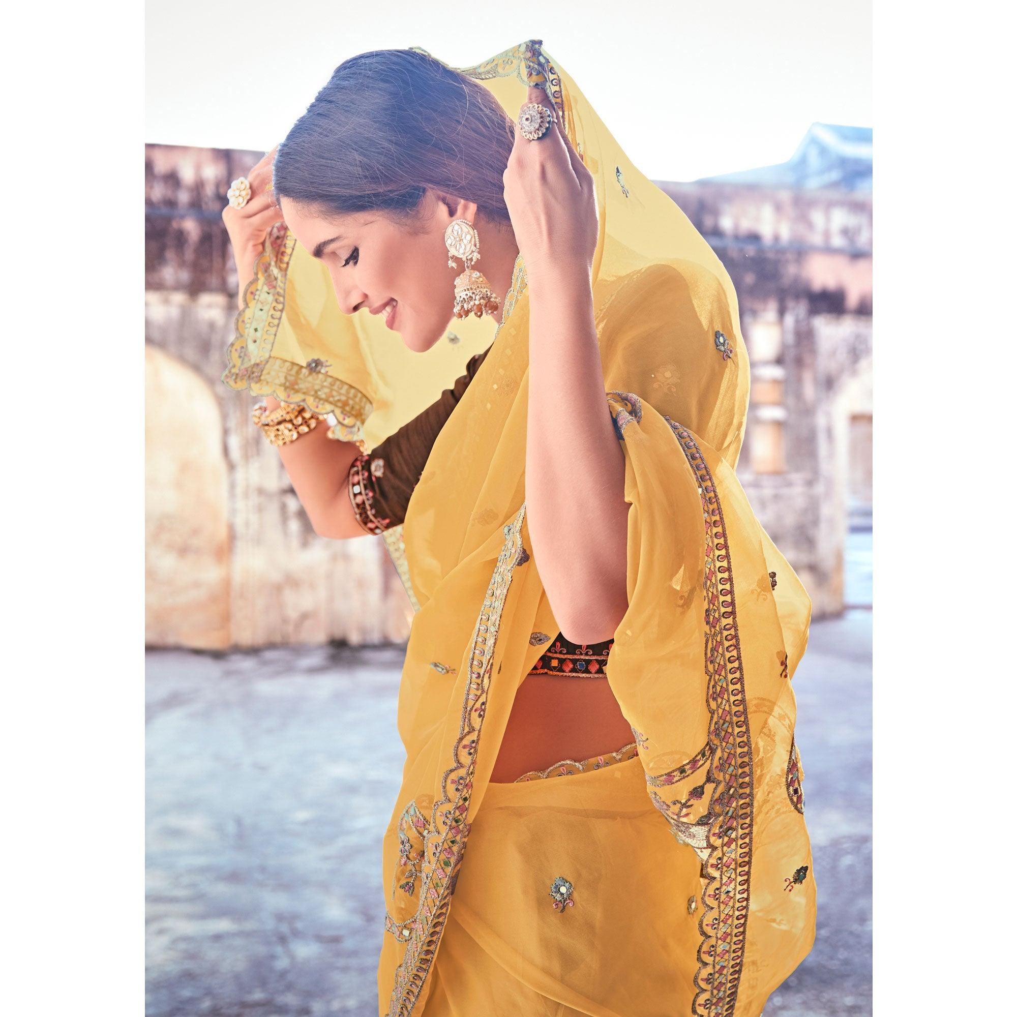 Yellow Partywear Embellished & Zari Organza Saree - Peachmode