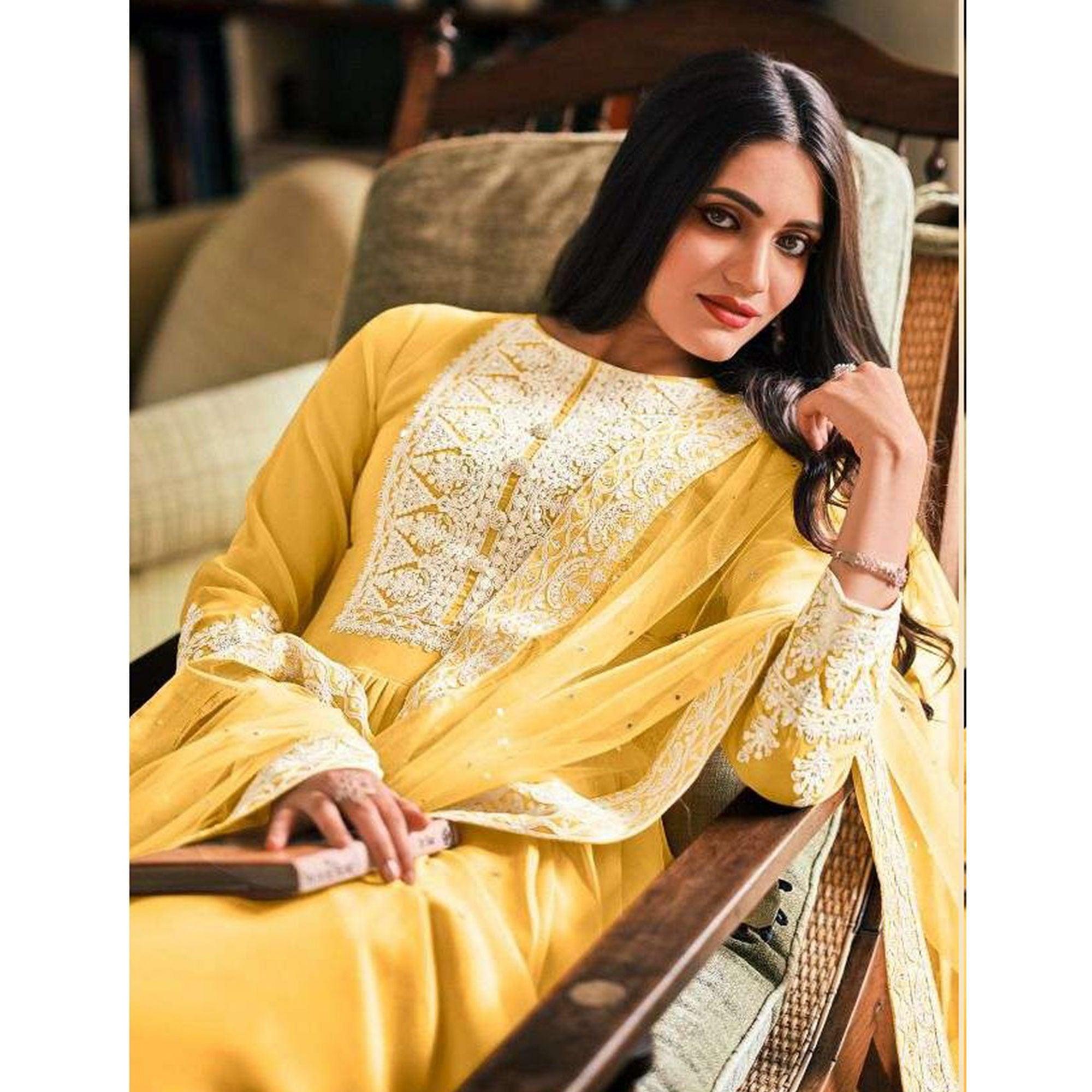 Yellow Partywear Embroidered Faux Georgette Palazzo Suit - Peachmode