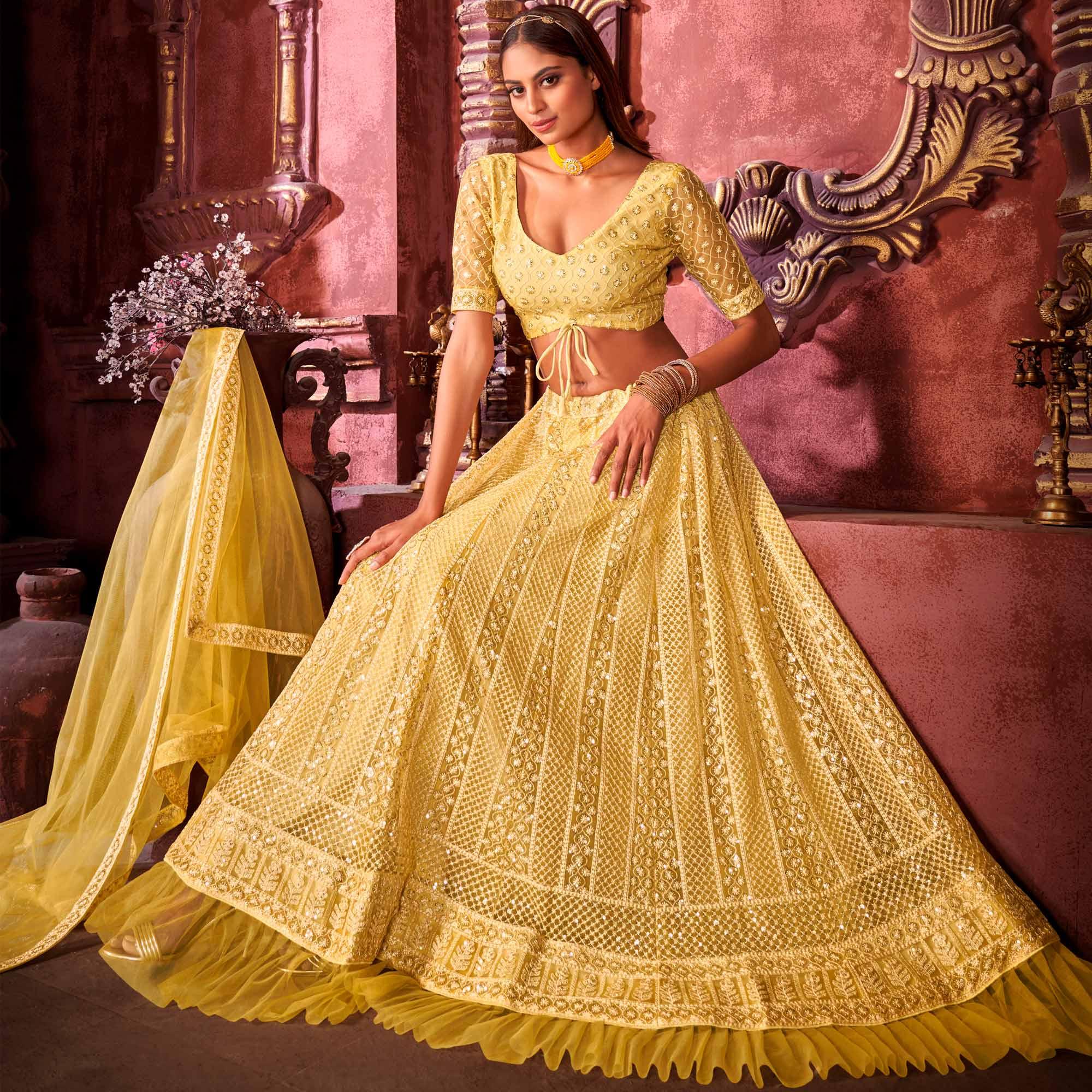 Yellow Partywear Embroidered Net Lehenga Choli - Peachmode