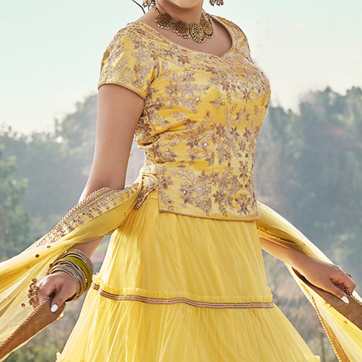 Yellow Partywear Floral Embroidered Soft Net Panelled Lehenga Choli - Peachmode