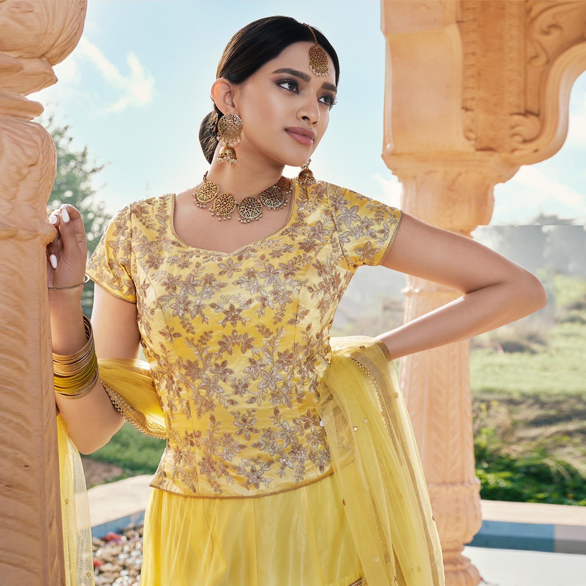 Yellow Partywear Floral Embroidered Soft Net Panelled Lehenga Choli - Peachmode