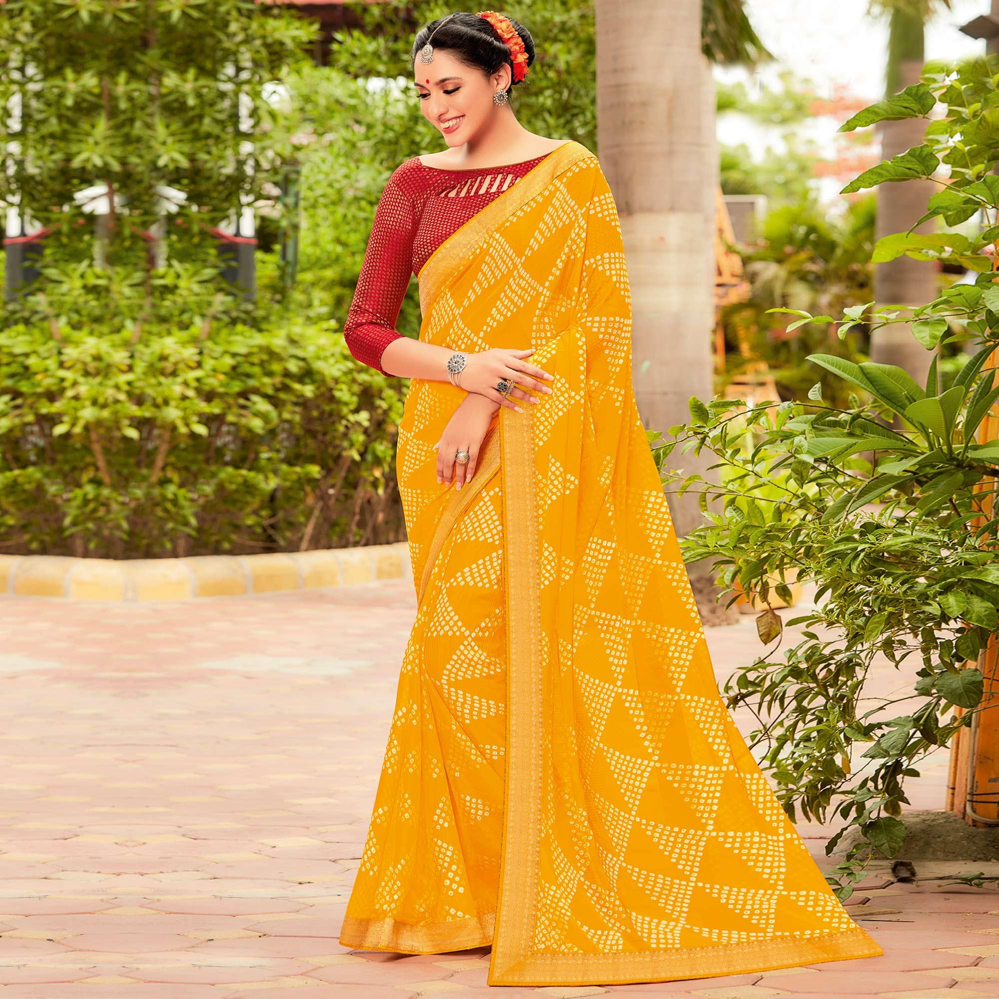 Yellow Partywear Printed Chiffon Saree With Border - Peachmode