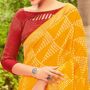Yellow Partywear Printed Chiffon Saree With Border - Peachmode