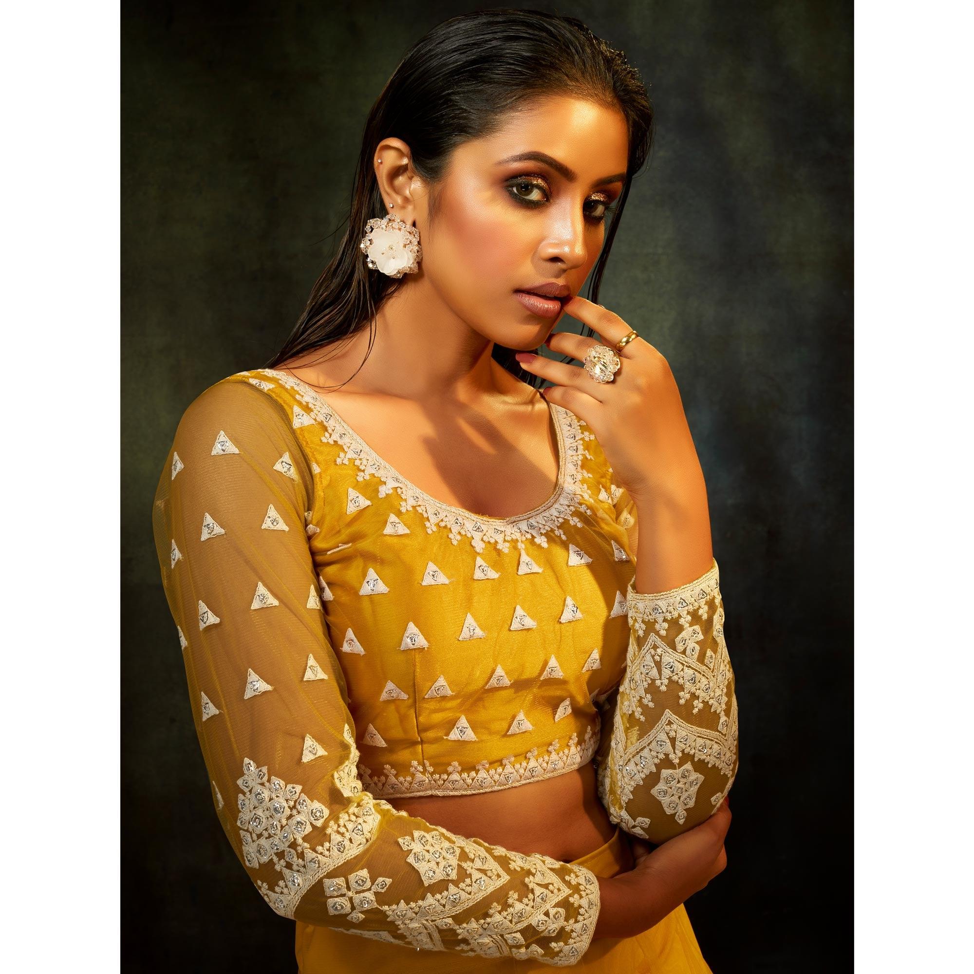 Yellow Partywear Sequence Embroidered Net Lehenga Choli - Peachmode