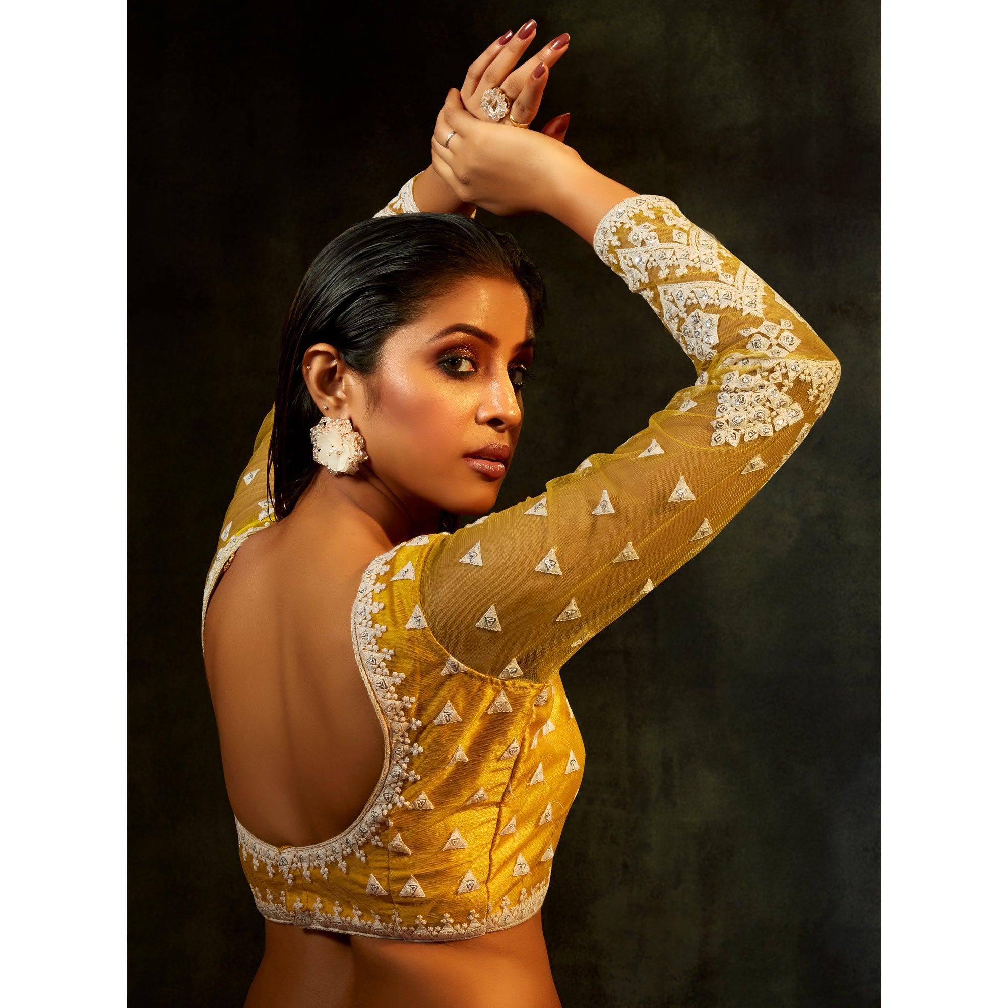 Yellow Partywear Sequence Embroidered Net Lehenga Choli - Peachmode