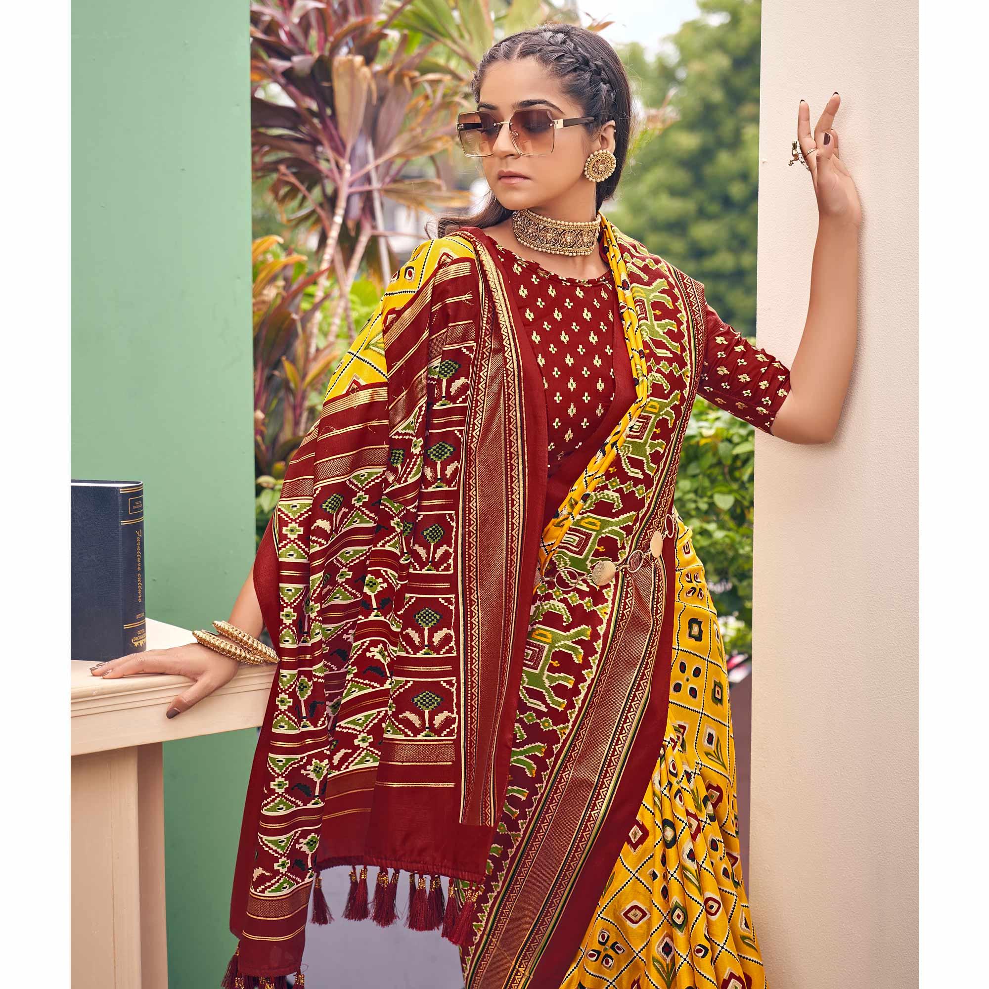 Yellow Patola Printed Silk Saree With Tassels - Peachmode