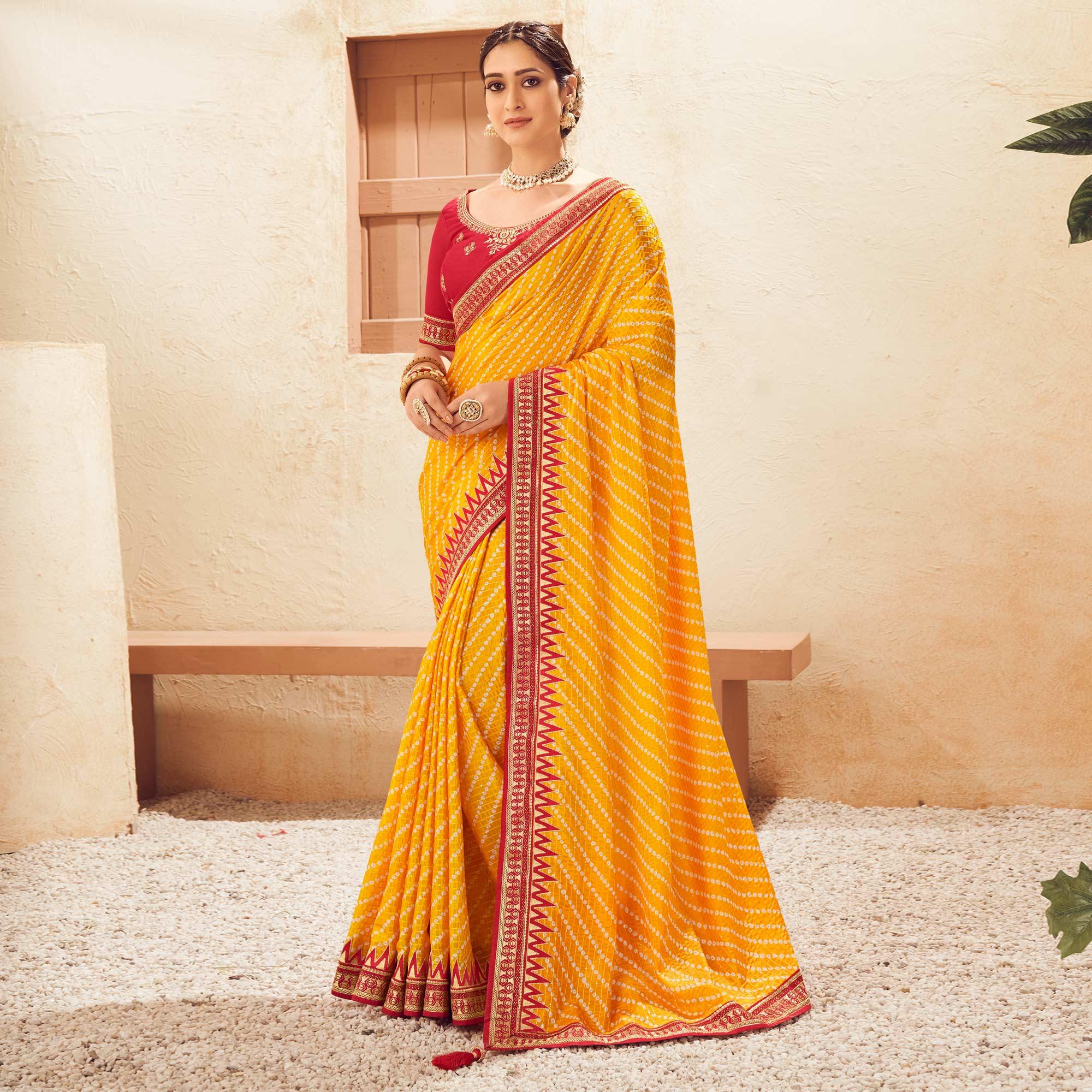 Yellow Printed With Embellished Chiffon Saree With Tassels - Peachmode