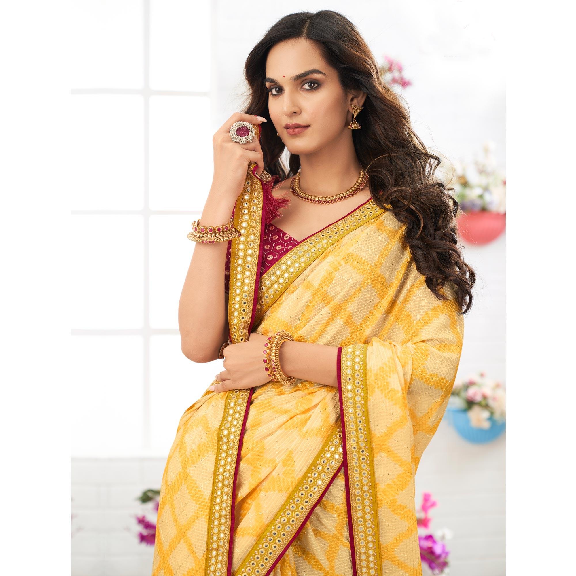 Yellow Printed With Embellished Chiffon Saree With Tassels - Peachmode