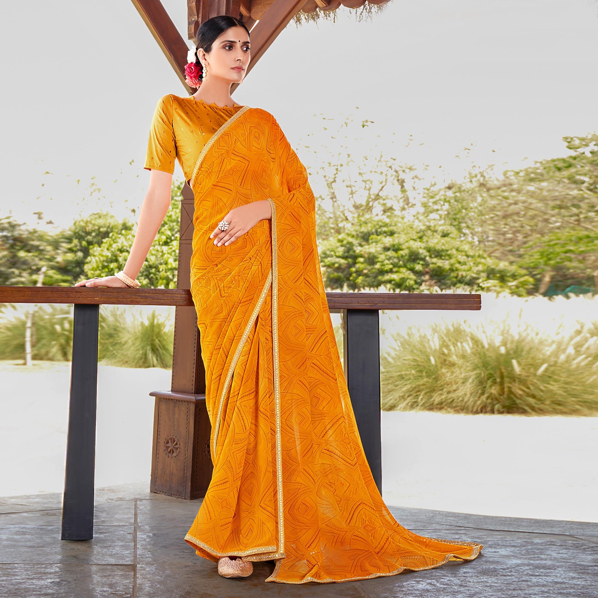 Yellow Printed With Sequence Embroidered Border Georgette Saree - Peachmode