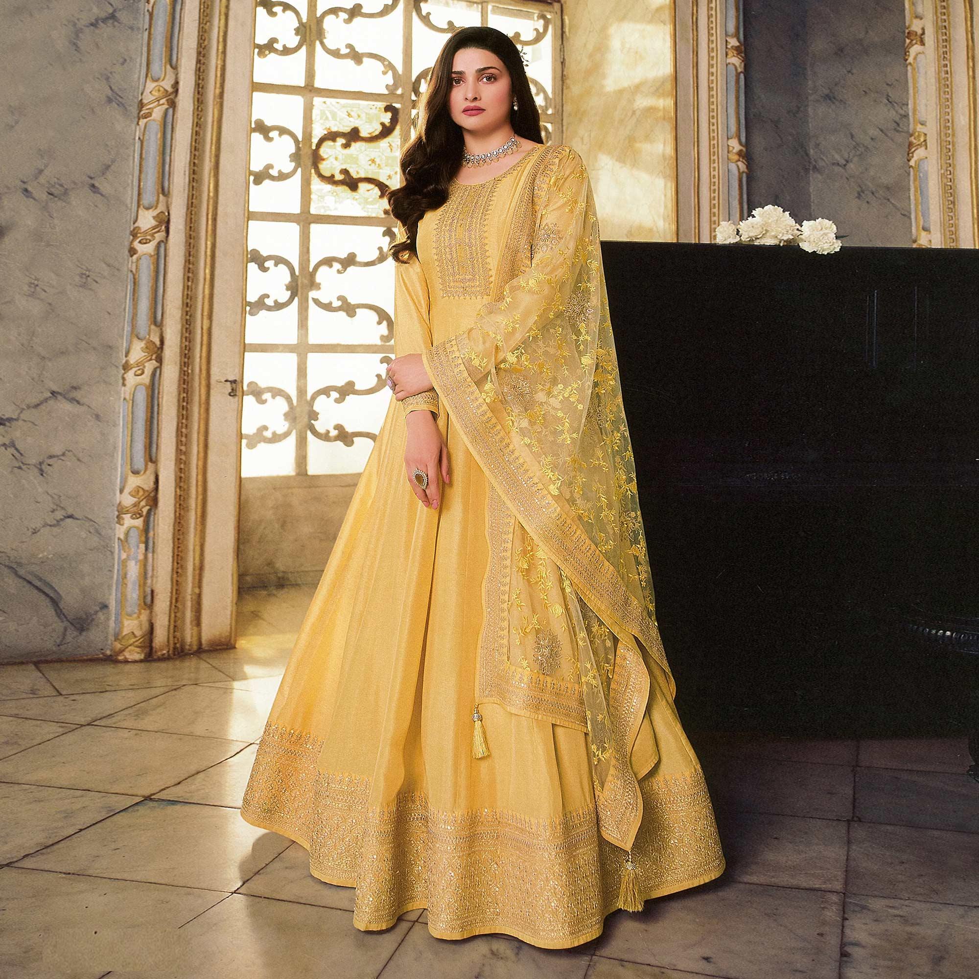 Yellow Sequence Embroidered Dola Silk Anarkali Style Gown - Peachmode