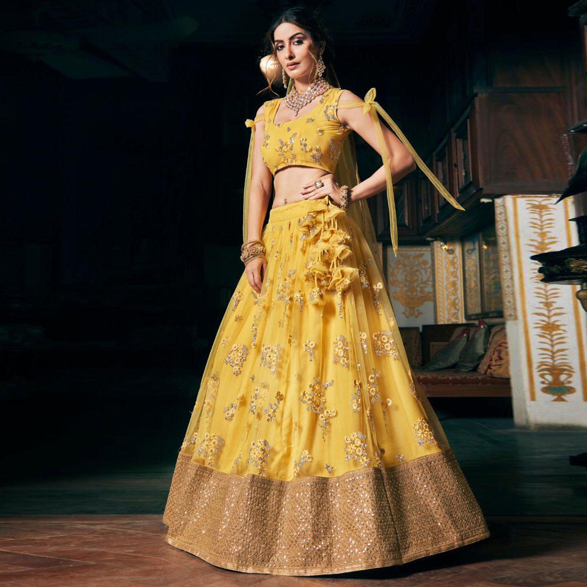 Yellow Wedding Wear Floral Embroidery With Sequence And Dori Work Net Lehenga Choli - Peachmode