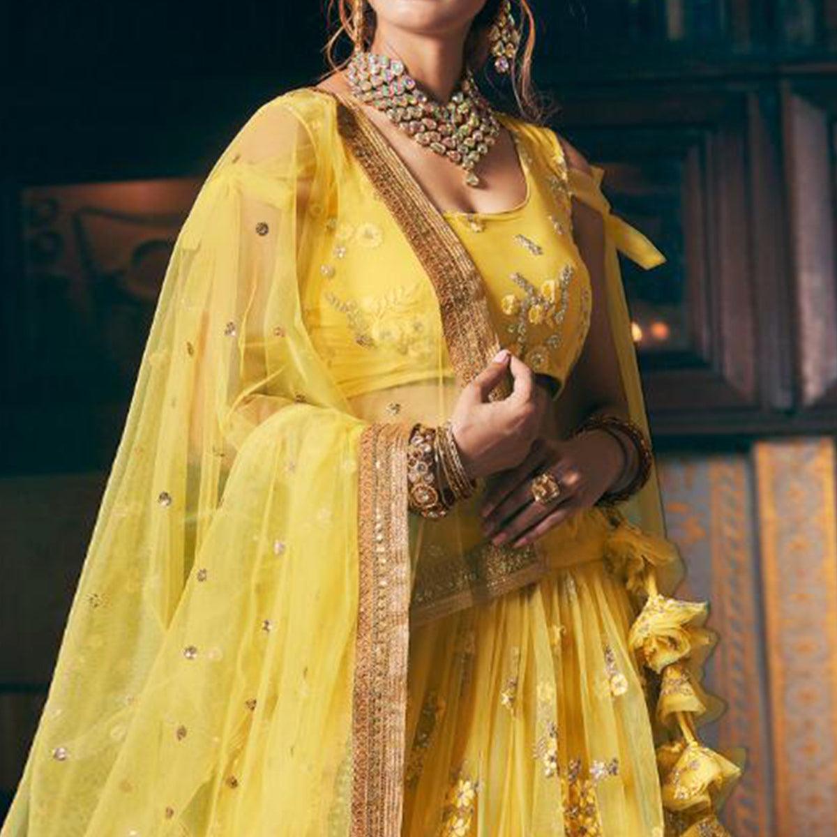 Yellow Wedding Wear Floral Embroidery With Sequence And Dori Work Net Lehenga Choli - Peachmode