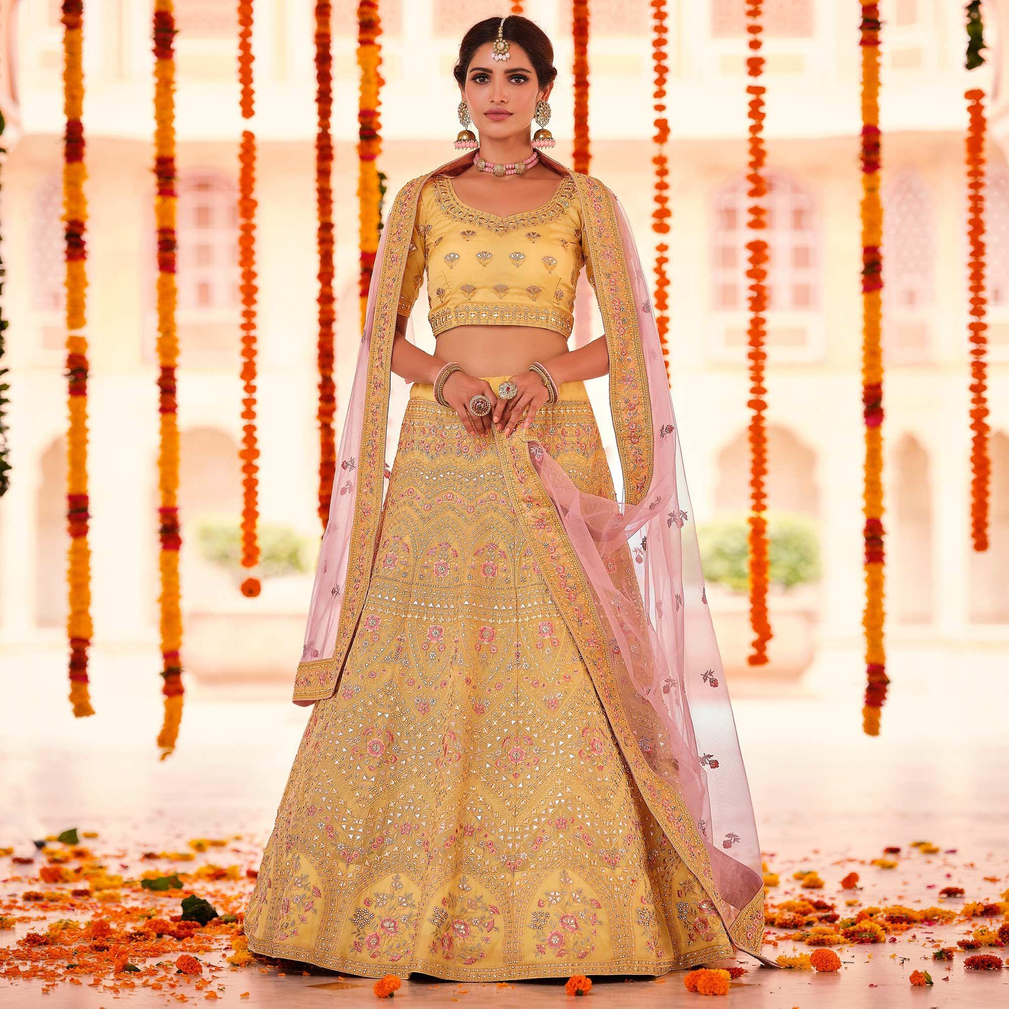 Yellow Wedding Wear Heavy Embroidered Organza Lehenga Choli - Peachmode
