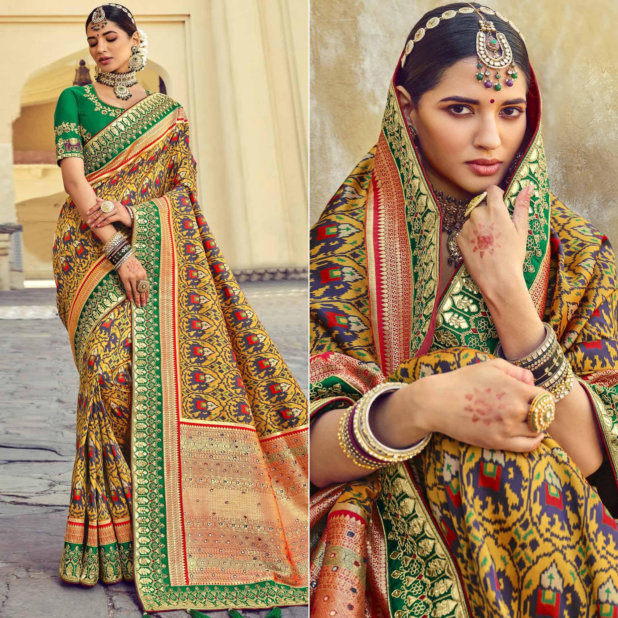 Yellow Wedding Wear Resham With Embellished Silk Patola Saree - Peachmode