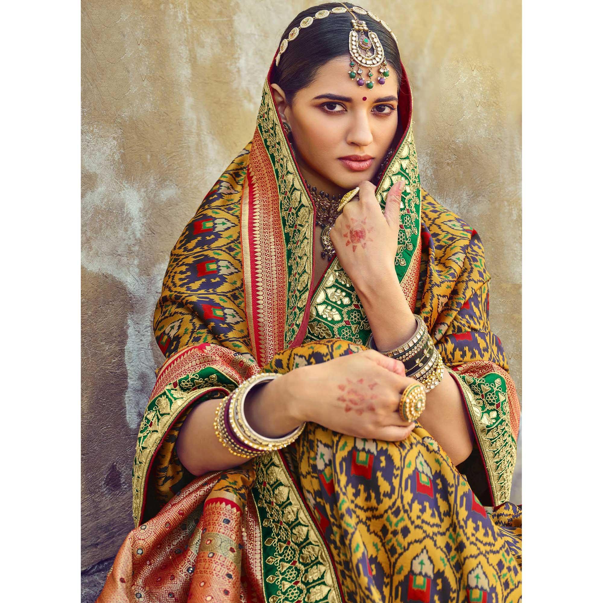 Yellow Wedding Wear Resham With Embellished Silk Patola Saree - Peachmode