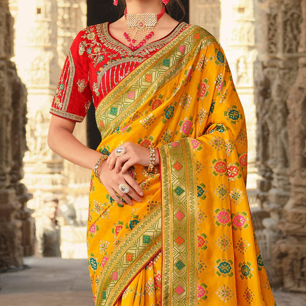 Yellow Wedding Wear Woven Silk Saree With Tassels - Peachmode