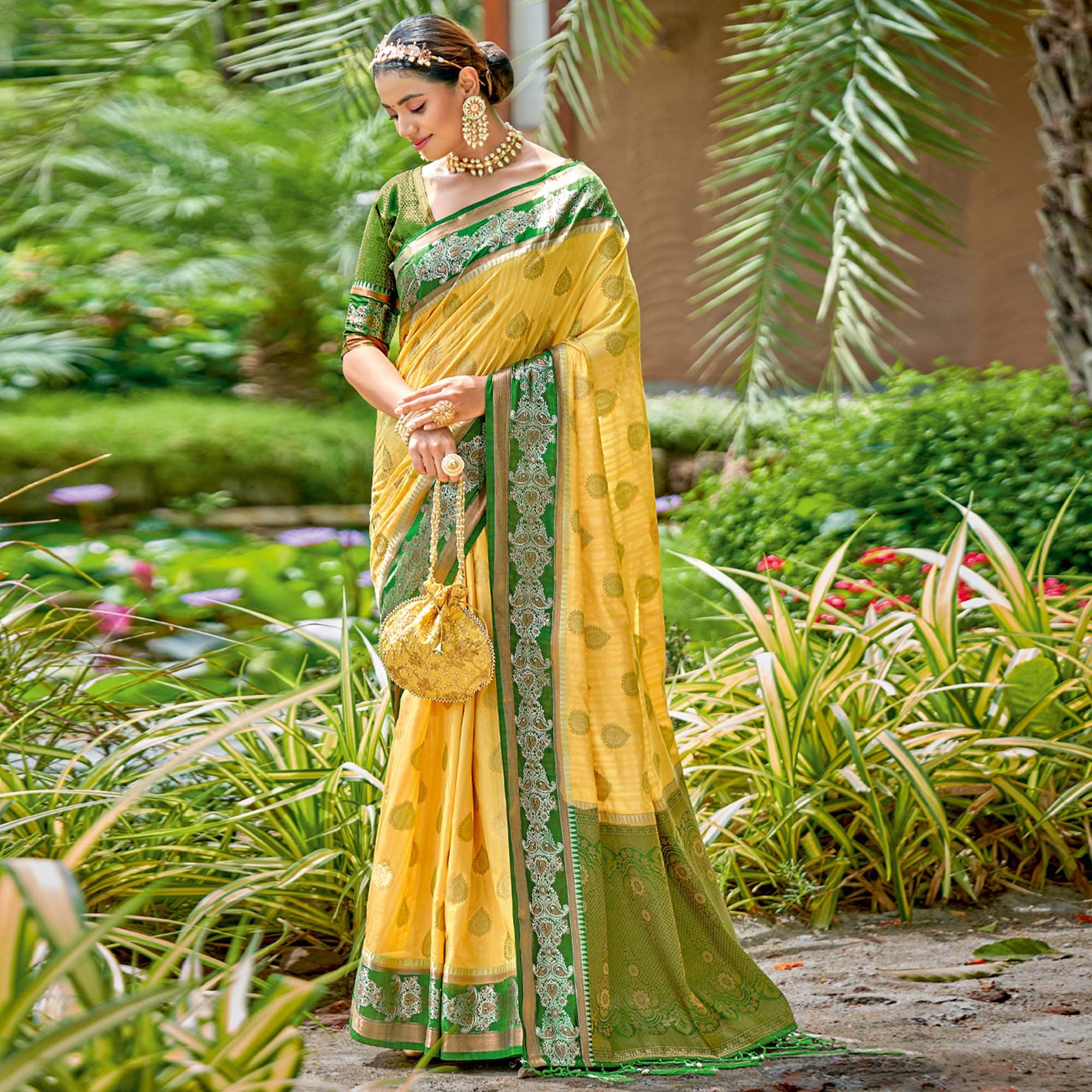 Yellow Woven Banarasi Silk Saree With Tassels - Peachmode