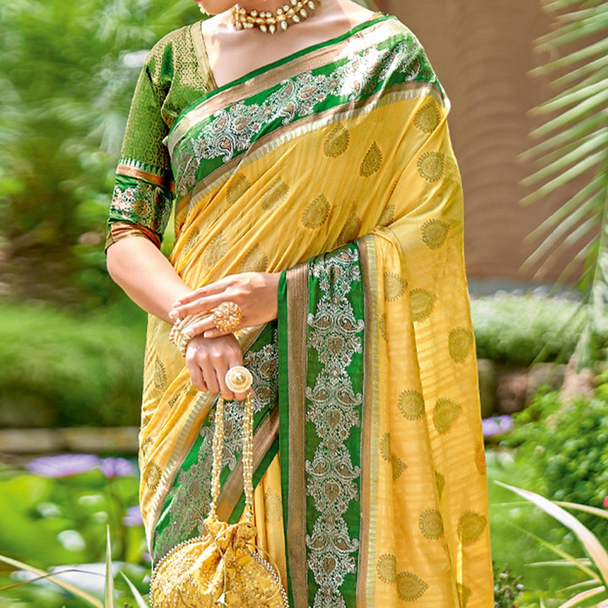 Yellow Woven Banarasi Silk Saree With Tassels - Peachmode