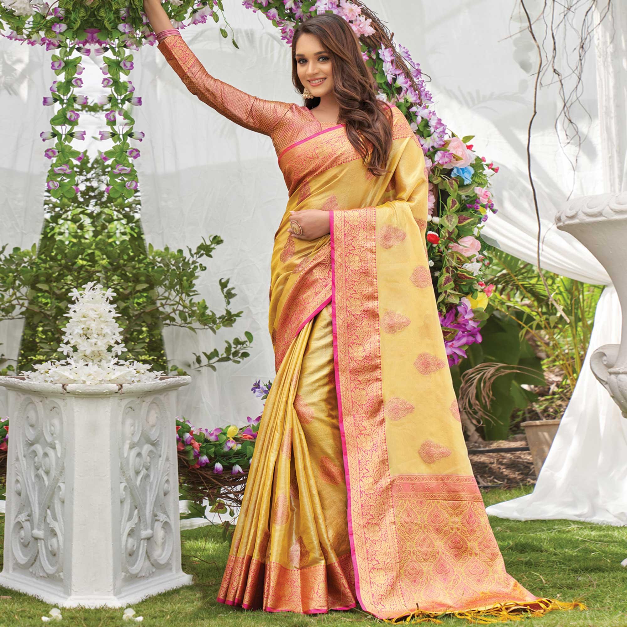 Yellow Woven Organza Saree with Tassels - Peachmode