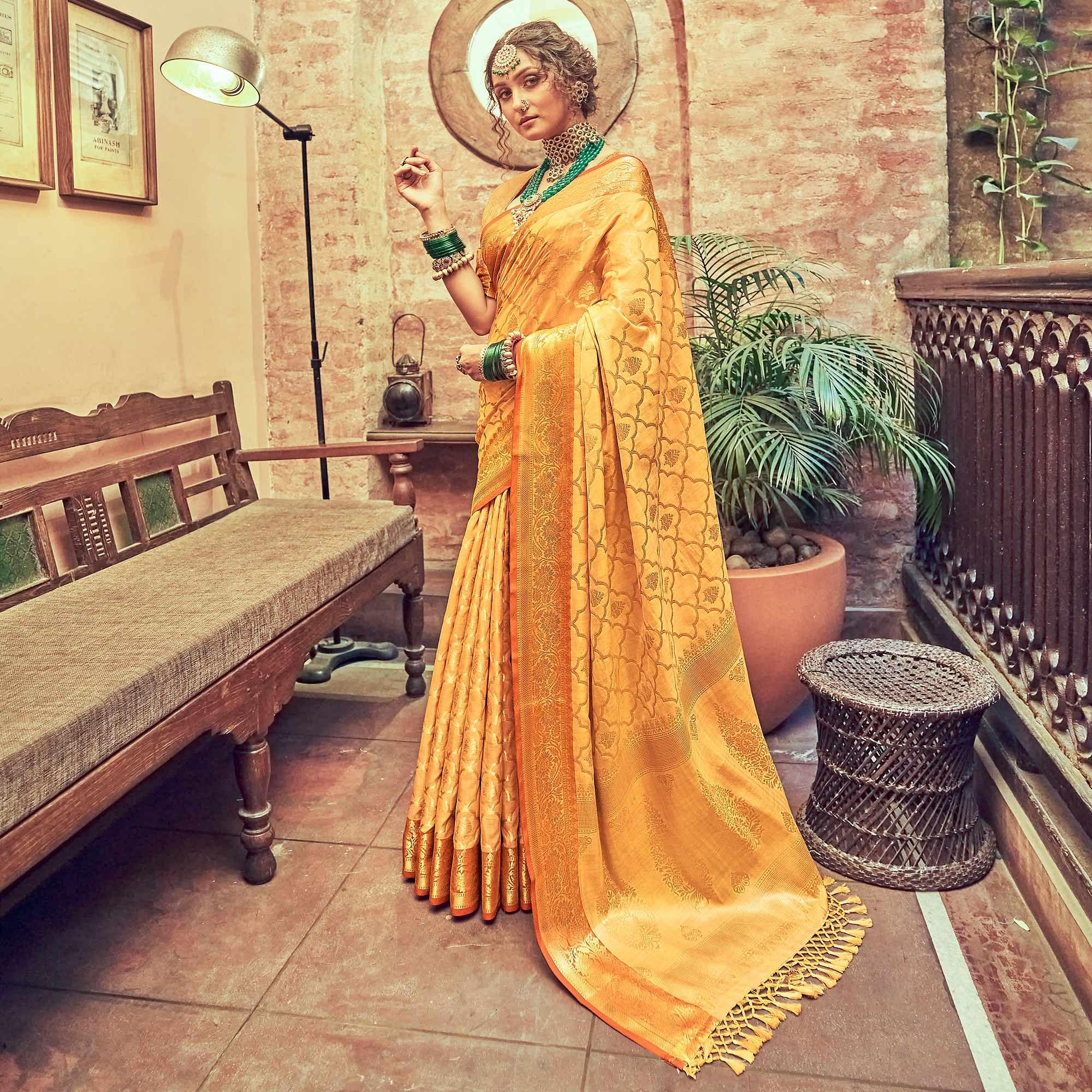 Yellow Woven Pure Silk Saree With Tassels - Peachmode