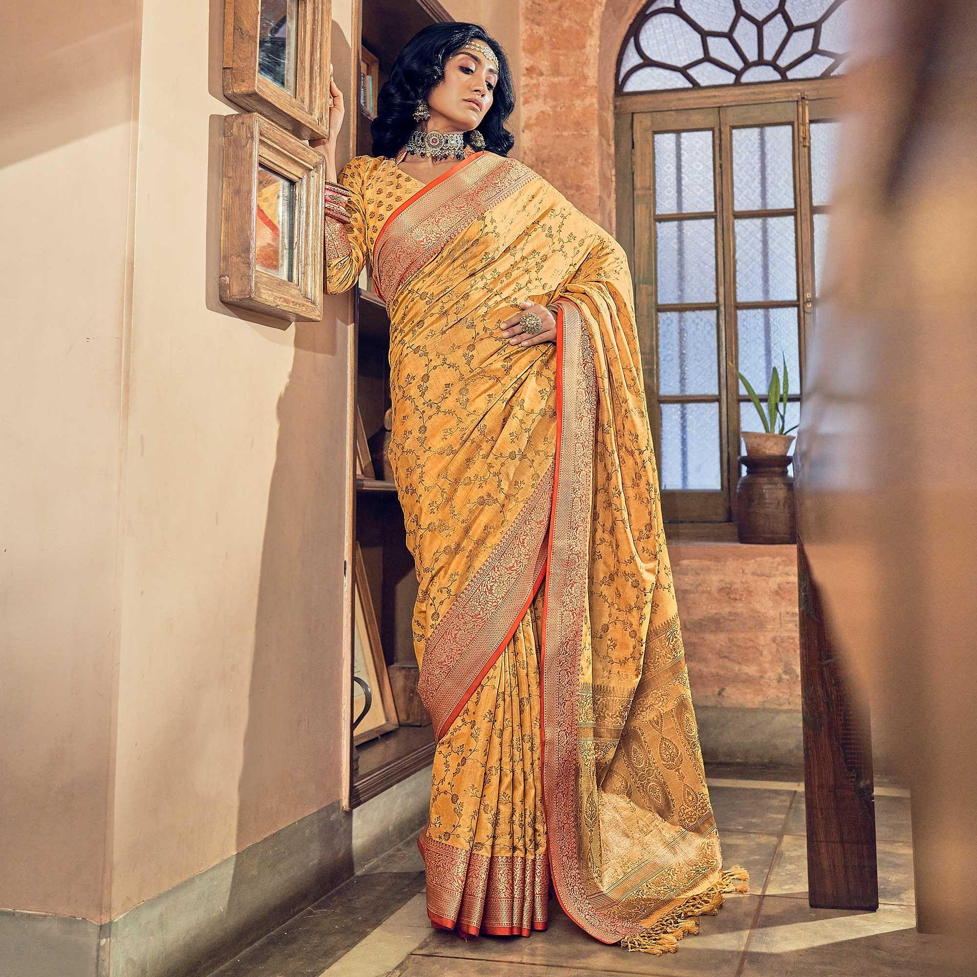 Yellow Woven Pure Silk Saree With Tassels - Peachmode